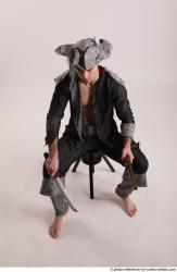 JACK PIRATE SITTING POSE WITH GUN AND DAGGER